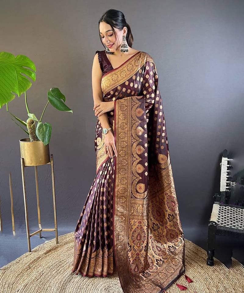 traditional banarasi silk saree in deep maroon with rich golden zari weaving, heavy pallu, and unstitched blouse piece traditional banarasi silk saree in deep maroon with rich golden zari weaving, heavy pallu, and unstitched blouse piece